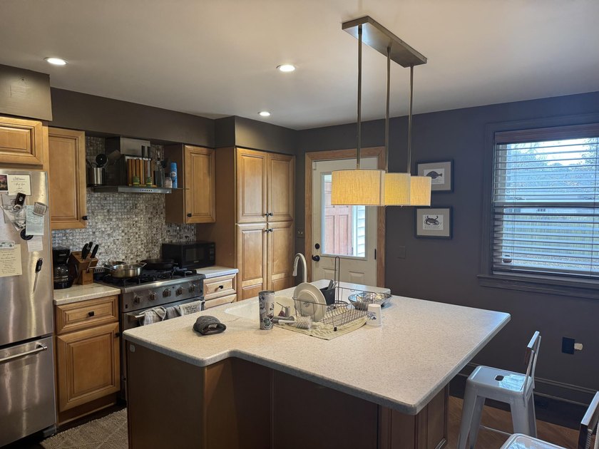Exceptional investment opportunity or future home! This 4- - photo 8