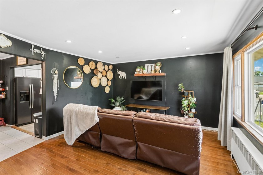 Welcome to 2877 Calvin, a classic cape style residence nestled - photo 5
