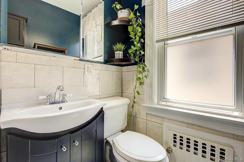Welcome to 90-10 69th Avenue - a private, detached 2-family home - photo 36