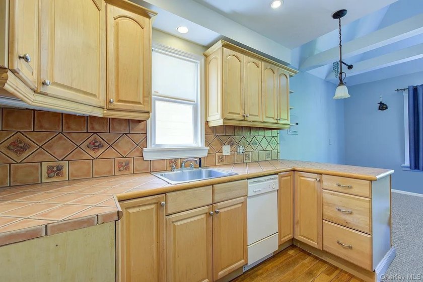 Welcome to 90-10 69th Avenue - a private, detached 2-family home - photo 43