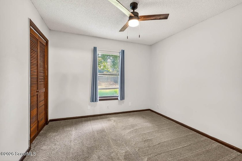 Welcome home to this charming 3-bedroom, 2-bath residence in the - photo 17