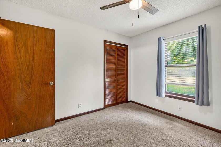 Welcome home to this charming 3-bedroom, 2-bath residence in the - photo 18