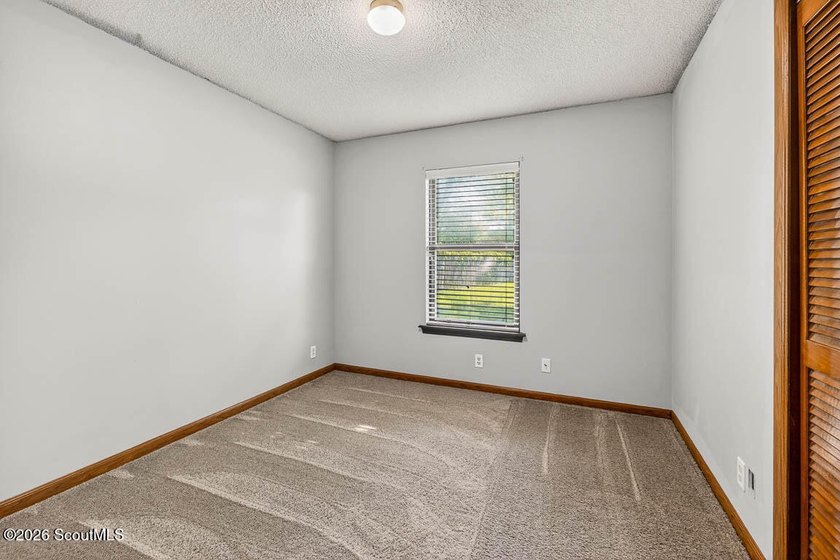 Welcome home to this charming 3-bedroom, 2-bath residence in the - photo 19