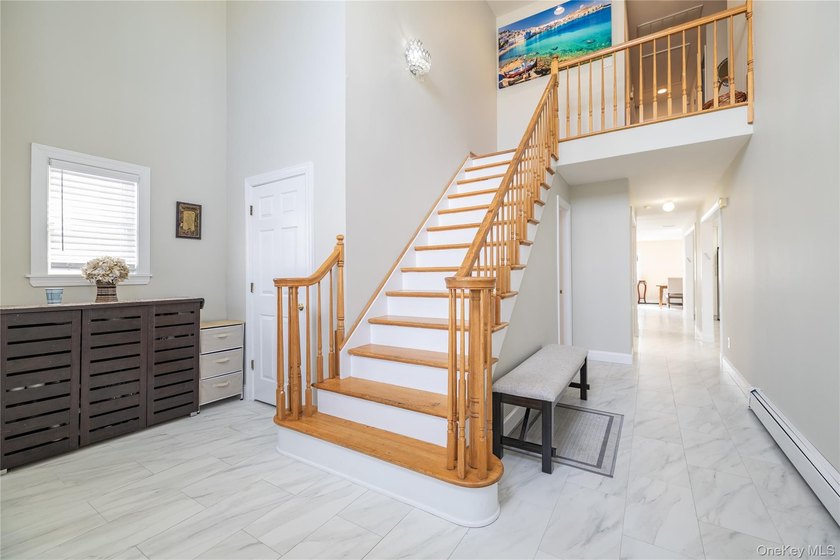 Long Beach Spacious COLONIAL you enter through two story foyer - photo 4