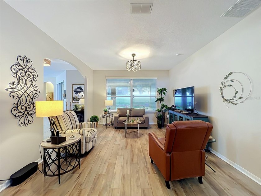 As you enter the Home you will notice the open floor plan, with - photo 11
