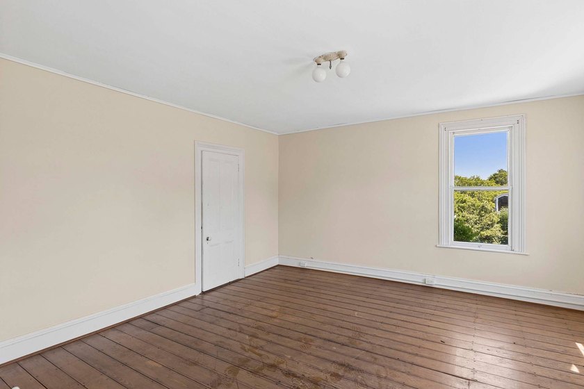 The roughly 4,400 +/- SF home sits on 2.84 acres - built in 1867 - photo 15