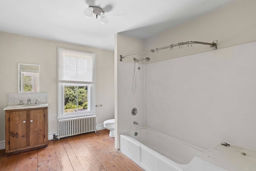 The roughly 4,400 +/- SF home sits on 2.84 acres - built in 1867 - photo 18