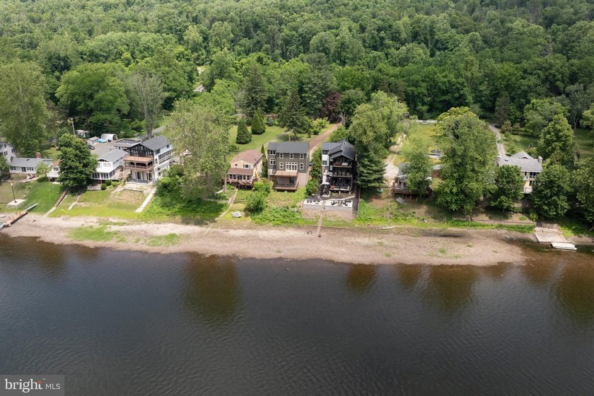 Some homes are seasonal escapes. 159 Byram Lane is something far - photo 5