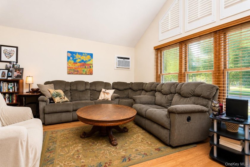 Located on a cul-de-sac in desirable Mount Sinai, this charming - photo 2