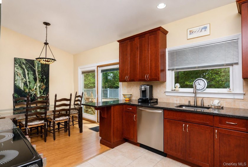 Located on a cul-de-sac in desirable Mount Sinai, this charming - photo 5