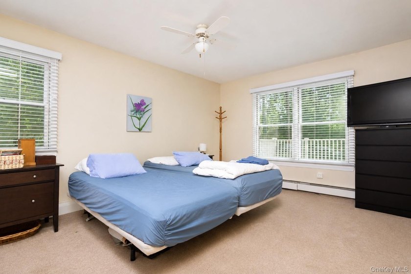 Located on a cul-de-sac in desirable Mount Sinai, this charming - photo 9