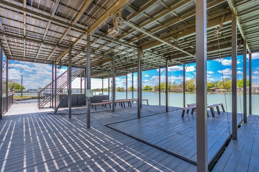 Discover the epitome of waterfront luxury living with this - photo 11