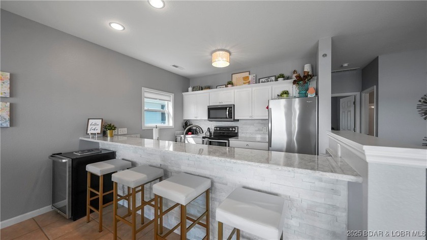 Welcome to this stunning 3 Bed/3 Bath top-floor condo at the - photo 16