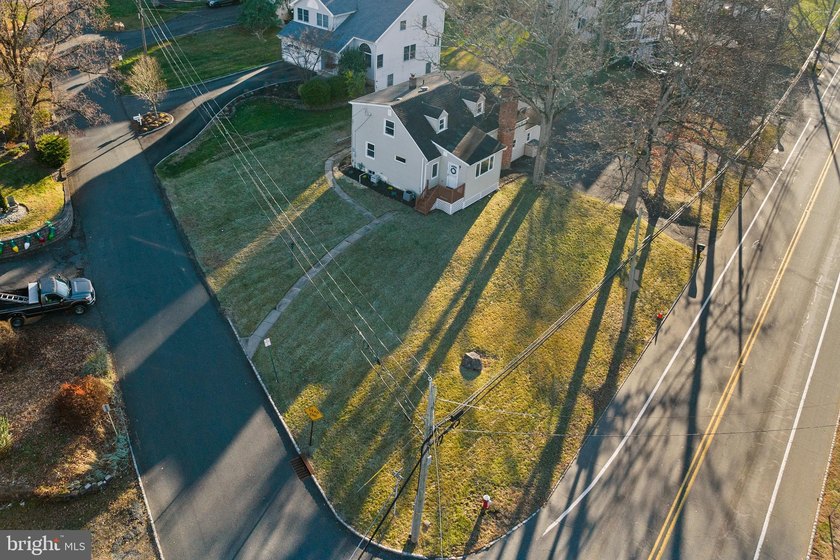 Welcome home to this beautifully renovated expanded Cape Cod - photo 5