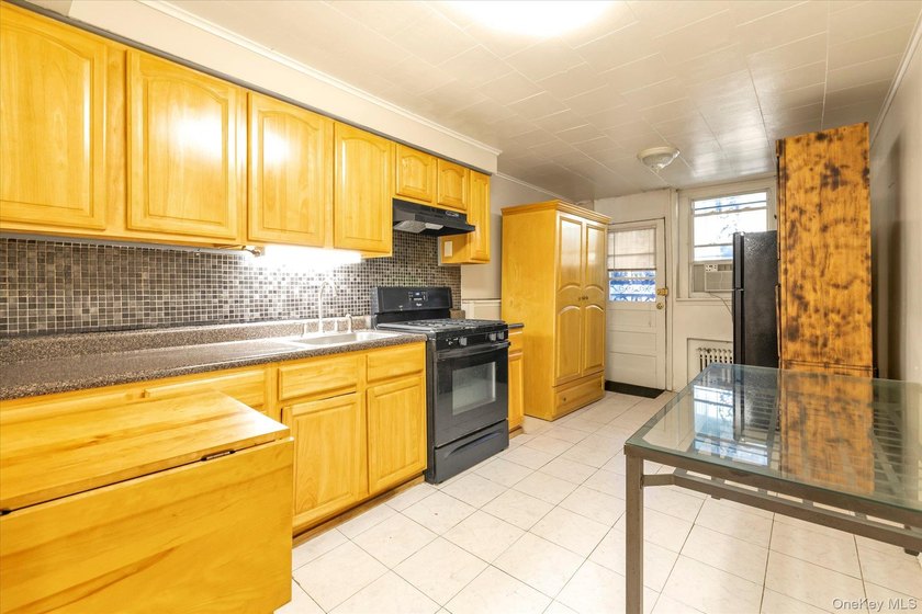 Prime Gravesend location! This 2 family property is an - photo 15