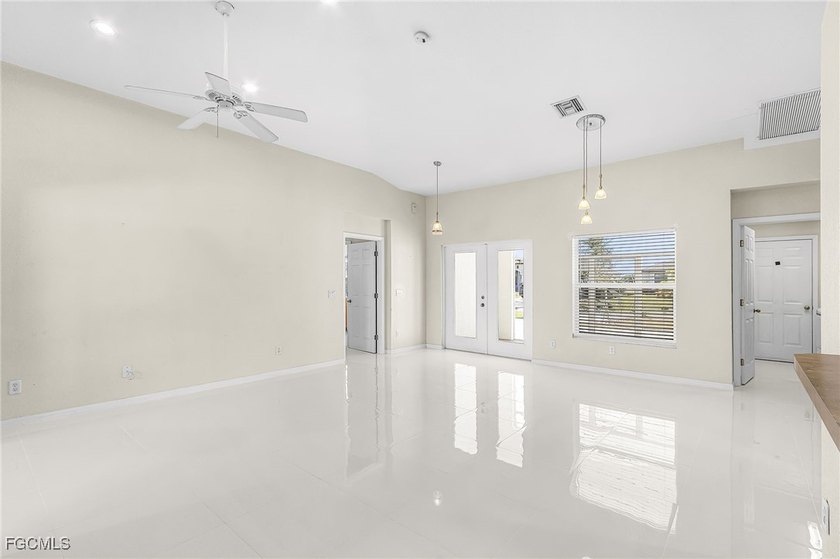 This stunning 4-bedroom, 2.5-bath waterfront pool home is - photo 10