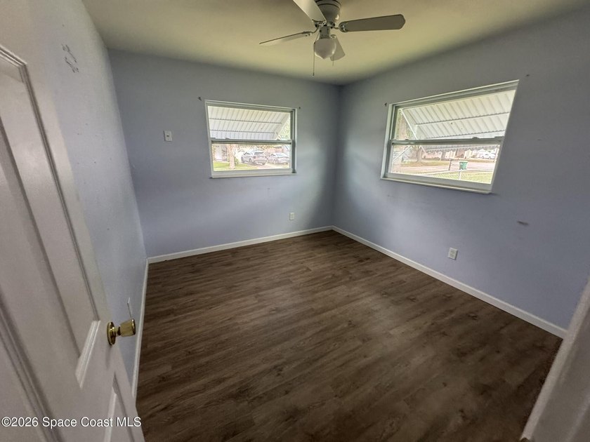No HOA! Enjoy a light and bright interior with a fully fenced - photo 12