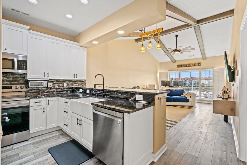 Fully Renovated Top-Floor Oasis with amazing ICW Views - - photo 9