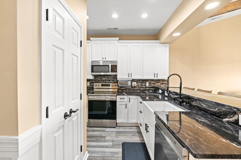 Fully Renovated Top-Floor Oasis with amazing ICW Views - - photo 10