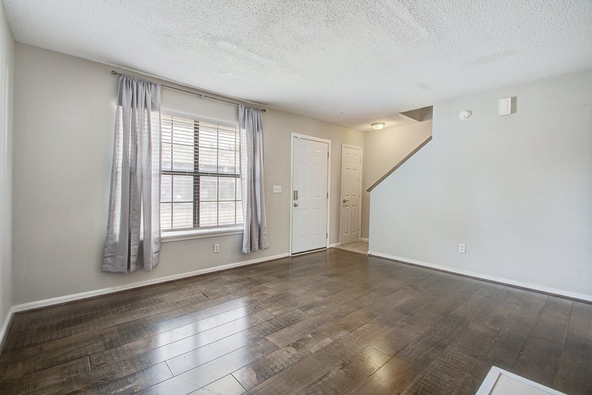 Move in ready two bedroom townhouse featuring a cozy fireplace - photo 5