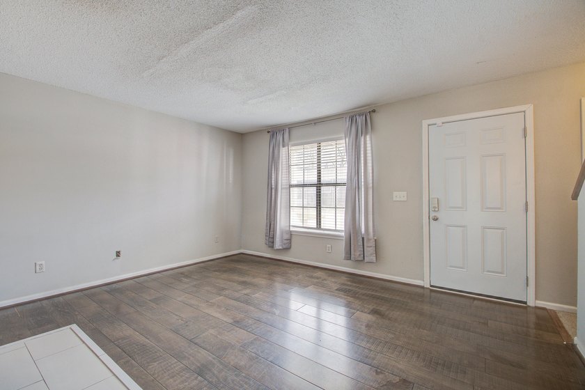 Move in ready two bedroom townhouse featuring a cozy fireplace - photo 6