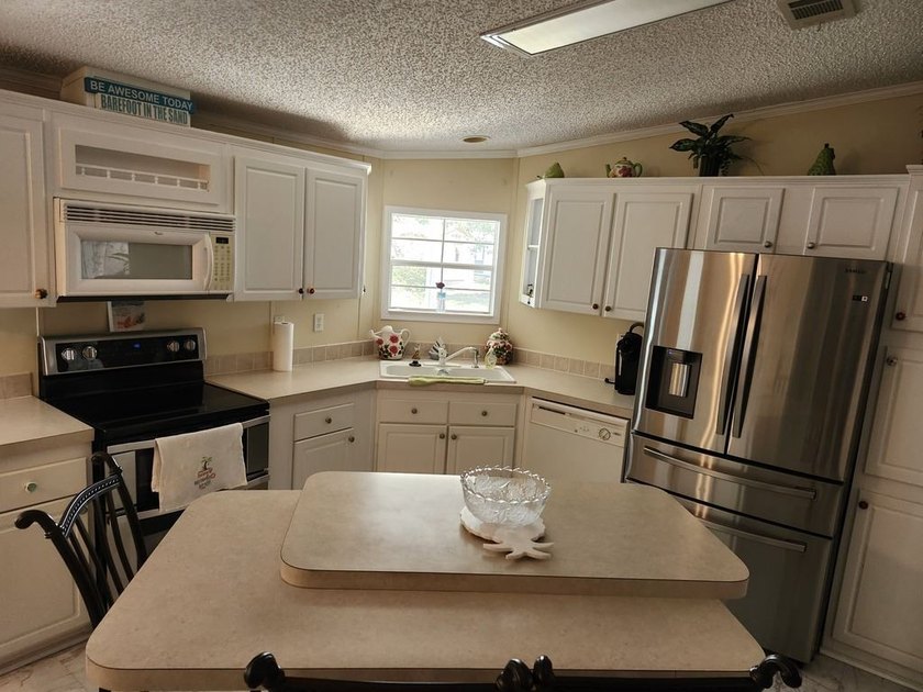 Welcome to Lakeside Terrace, a 55+ age-qualified active and - photo 12