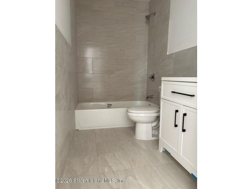 NEW CONSTRUCTION. Beautiful 2 Family 6 over 6 located on - photo 5