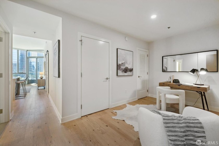 Step into this stunning top-floor 1-bedroom, 1.5-bathroom home - photo 3
