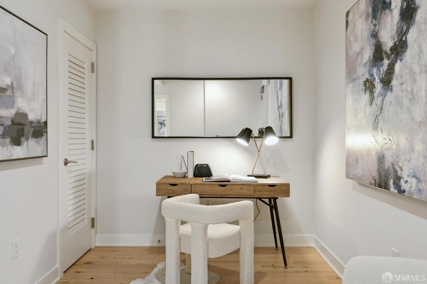 Step into this stunning top-floor 1-bedroom, 1.5-bathroom home - photo 4
