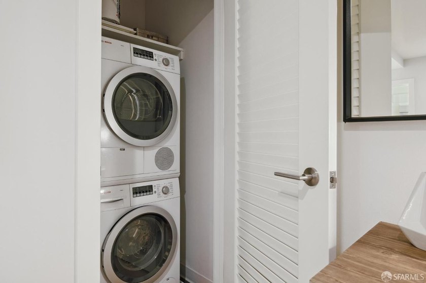 Step into this stunning top-floor 1-bedroom, 1.5-bathroom home - photo 5
