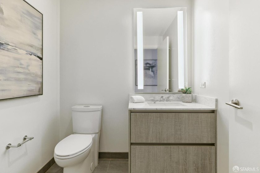 Step into this stunning top-floor 1-bedroom, 1.5-bathroom home - photo 6