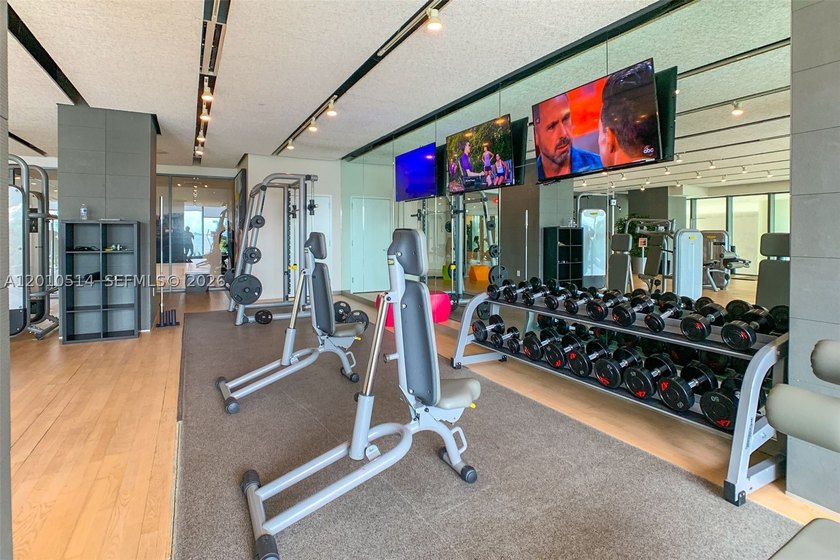 Experience elevated waterfront living at Icon Bay in this - photo 31