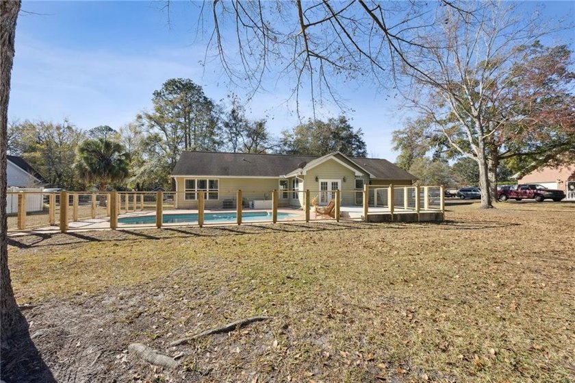 Warning: this house may cause spontaneous pool parties! Located - photo 39