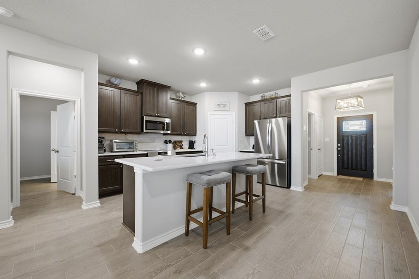 Custom built in 2024, 1515 Cape Velero offers refined waterfront - photo 29