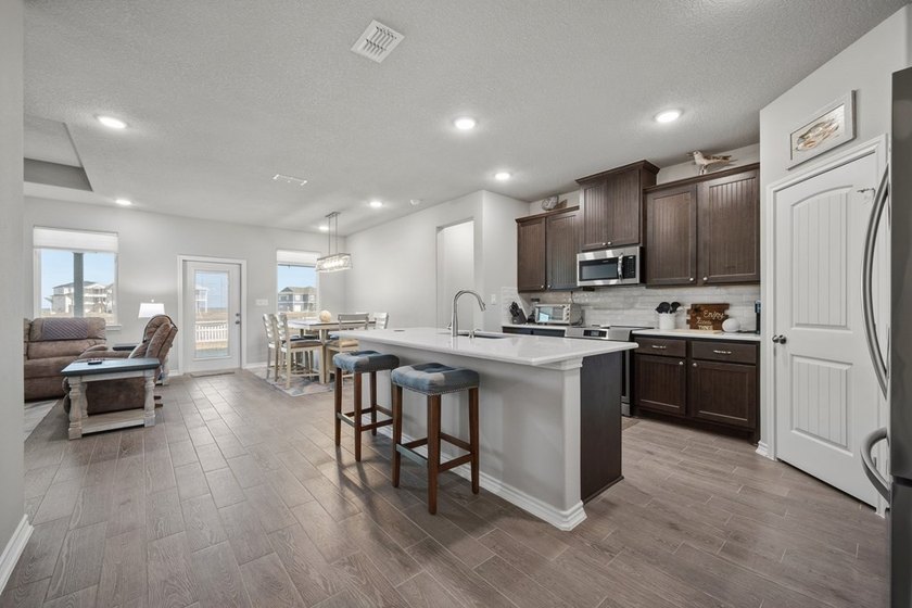 Custom built in 2024, 1515 Cape Velero offers refined waterfront - photo 34