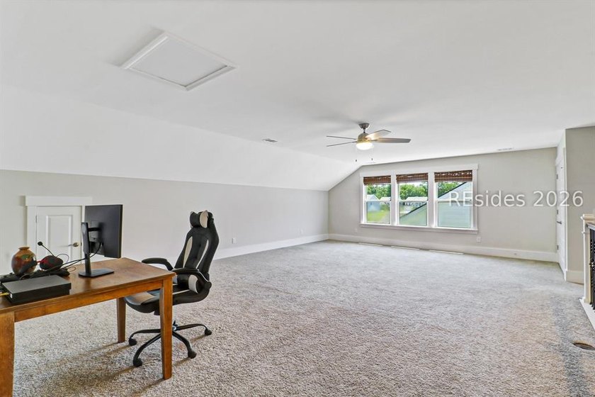 Welcome to 239 Rudder Run, an exceptional home in the highly - photo 30