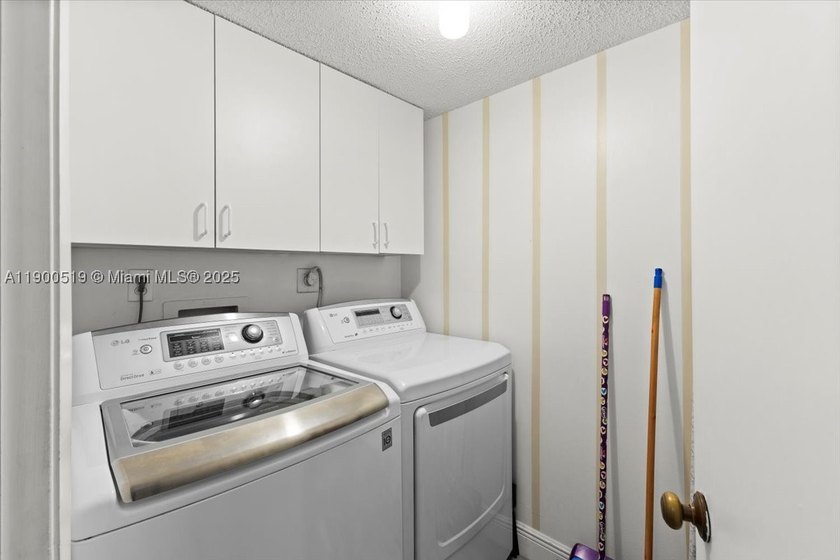 Welcome to this beautifully upgraded corner unit condo in the - photo 11