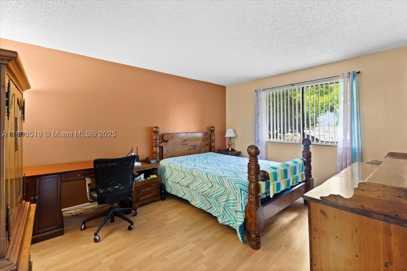 Welcome to this beautifully upgraded corner unit condo in the - photo 12