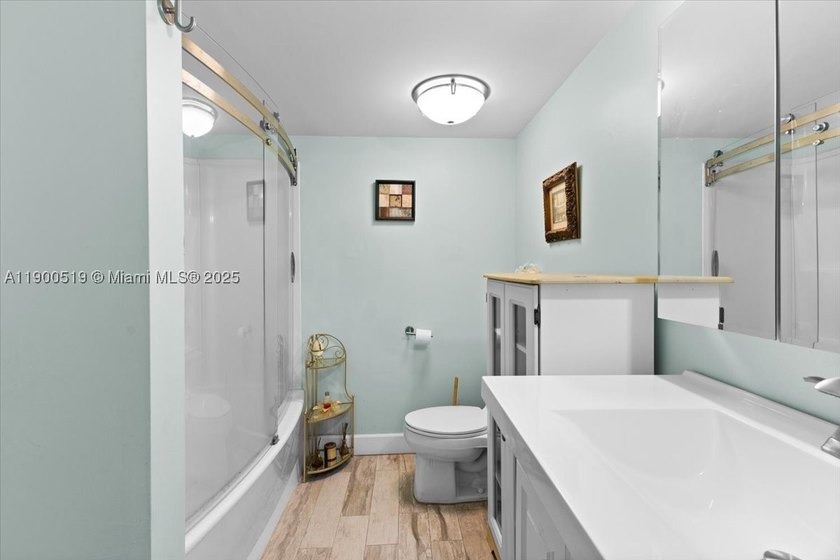 Welcome to this beautifully upgraded corner unit condo in the - photo 13