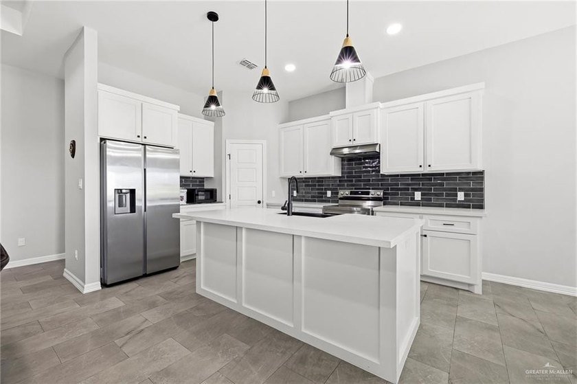 This beautifully maintained home, only a few years old, is - photo 8