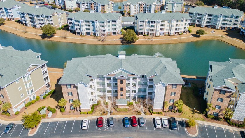 This amazing 3rd floor, end unit, in popular Magnolia North, is - photo 4