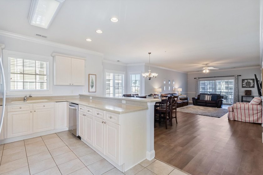 This amazing 3rd floor, end unit, in popular Magnolia North, is - photo 10