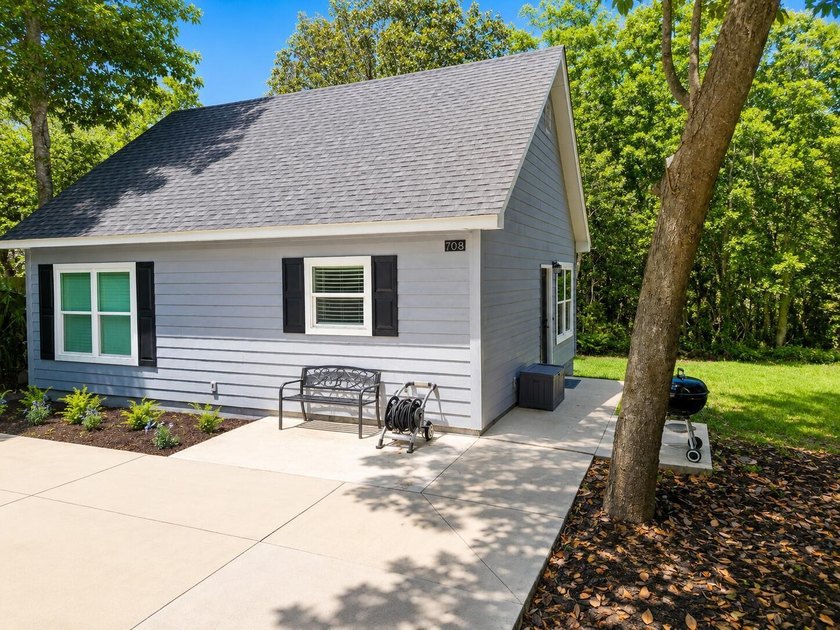 Tucked away on a large, private lot surrounded by beautiful - photo 6