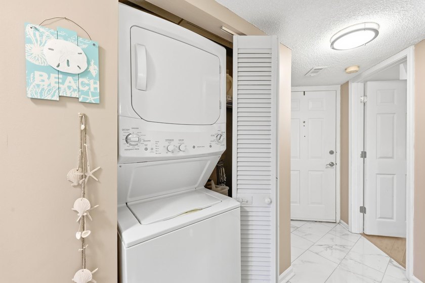 Come see this beautifully decorated condo located in the heart - photo 7
