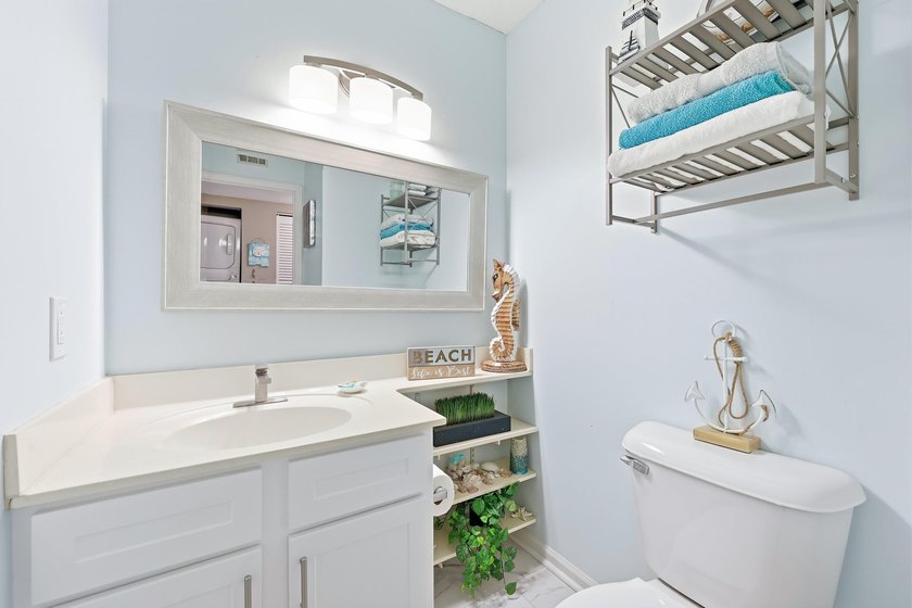 Come see this beautifully decorated condo located in the heart - photo 9