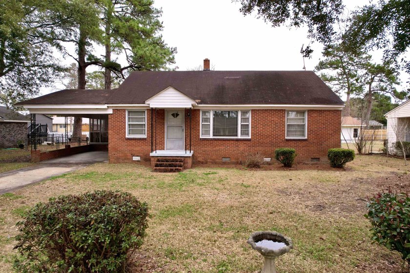 Charming 3-bedroom, 1-bath brick ranch located in the heart of - photo 3