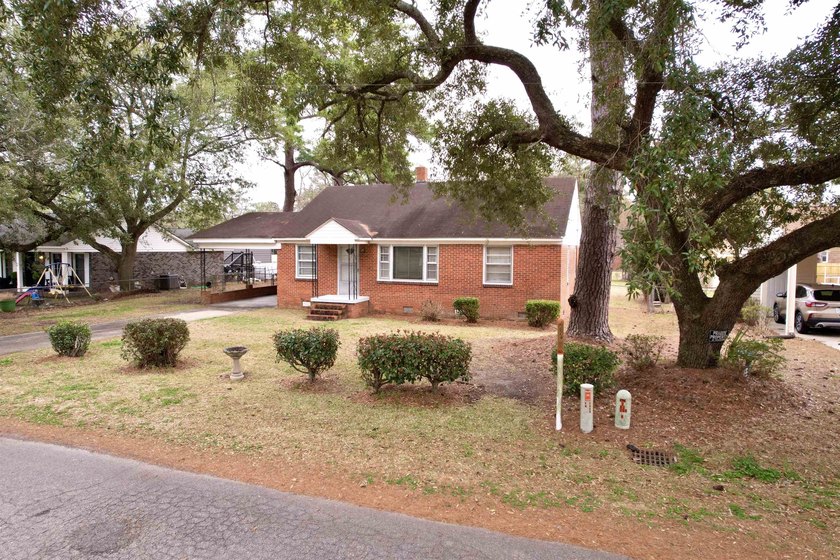 Charming 3-bedroom, 1-bath brick ranch located in the heart of - photo 4