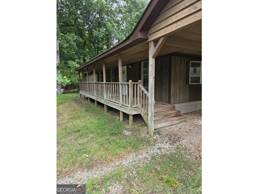 Opportunity awaits! Bring your vision to this property located - photo 2