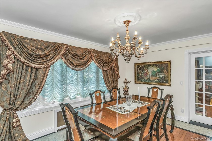 Set on a manicured corner lot in Bayside, this expanded Colonial - photo 7