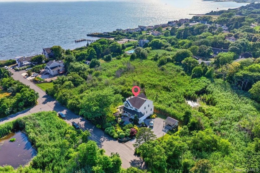 Here, at 266 Clinton Avenue, East Patchogue; a coastal haven - photo 29